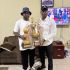 Sporting Supreme FC Presents Gothia and Dana Cup Trophies to NFF Technical Director Austin Eguavoen