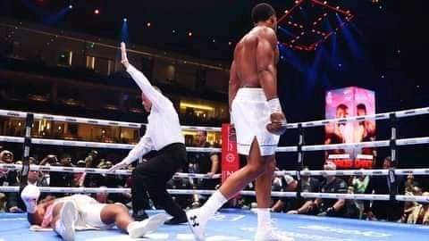 Savage Beast’, Anthony Joshua Knocks out Mouthy Francis Ngannou in Round Two of their World Heavyweight Bout. …Ngannou takes Oxygen in His Corner to Revive.