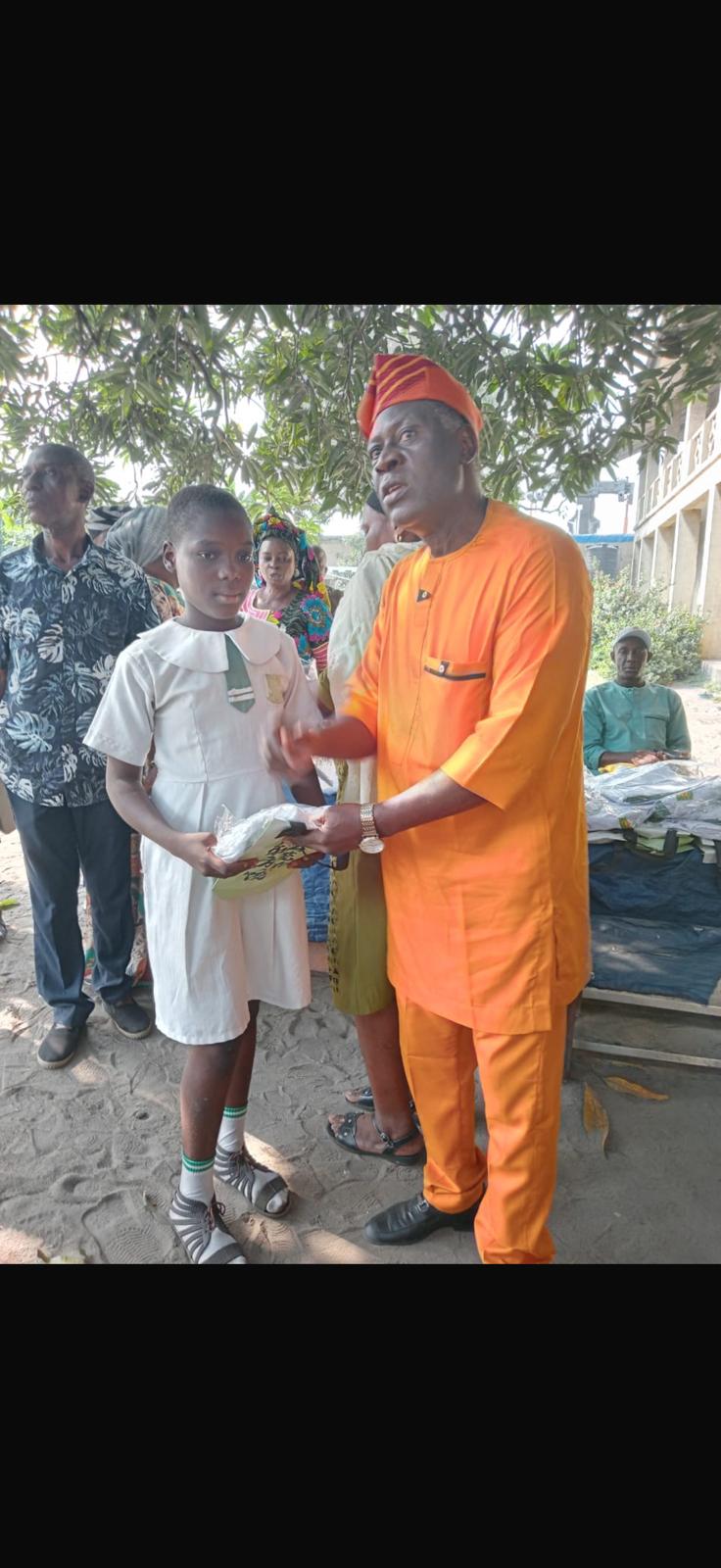 Former Super Eagles Player Paul Okoku Gifts Brand New Uniforms, Writing Materials To St Paul's Primary School pupils